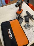 New Ridgid 18v drill/ driver with battery, charger, & bag, WORKS