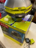 Ryobi floating speaker light show with Bluetooth. Comes with battery and charger. Turned on