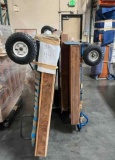 3 Hand Trucks, 3 Large Crated items, we did not uncrate. Platform dolly is not included in this lot.