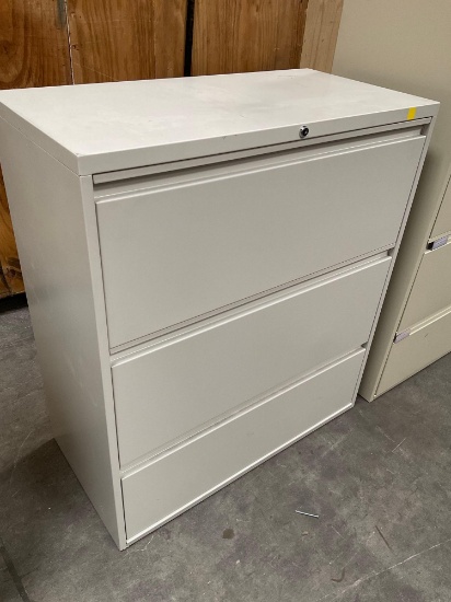 Lateral File Cabinet, Metal 3 drawer, Drawers have folders , see pic. 36" x 18" x 41"