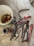 Bucket and assorted plumbing tools