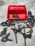 Plastic tool box and assorted clamps. 28 pieces