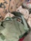 Military items, Large duffle bag, assorted pants, shirts, sweater. 9 pieces