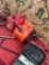 Assorted items. Wrenches, jumper cables m booklet, gasoline containers. 7 pieces