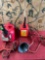 Assorted items. Gasoline containers, funnel, jumper cables. 5 pieces