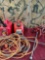 Gasoline cans, electrical cord, star wrench, jumper cable. 5 pieces
