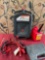 Automotive Used Oil container, 1 gallon gasoline container, jumper cables, empty box