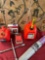 Assorted items. Gasoline containers, tint, clamps, tire inflator wrench. 6 pieces