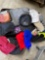 Chaps rolling luggage and assorted hats, clothes