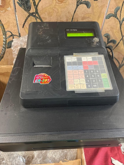 Sam5s cash register. Has key to turn on and key for cash register