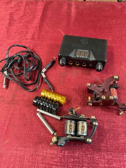 Untested ( no cord) Dragonhawk tattoo machine and assorted tattoo parts/ accessories
