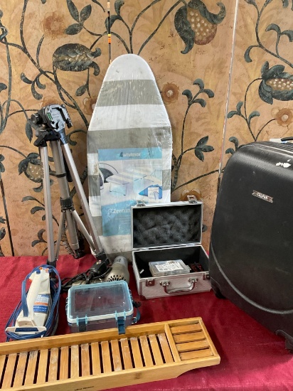 Assorted items. Luggage, iron board, iron, boxes, tripod, All electrical items turned on. 8 pieces