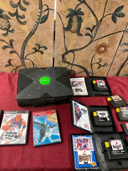 XBox console untested( no cord) 3) PlayStation games 5) EA Sports games 1) Genesis game