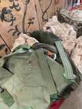 Military items, Large duffle bag, assorted pants, shirts, sweater. 9 pieces