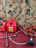 Assorted items. Gasoline containers, jumper cable, funnel, wrenches. 6 pieces