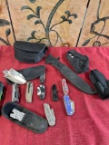 Assorted foldable knives, multi use tools, pouches, etc. 16 pieces