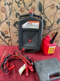 Automotive Used Oil container, 1 gallon gasoline container, jumper cables, empty box