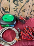 Automotive items. Oil drain pan, Jumper cables, Power wash hose.
