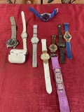 Assorted watches & pods. 10 pieces