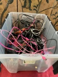 Assorted phone cords. Plastic tub not included