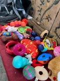 Large Reebok bag and assorted dog toys. 37 pieces