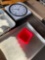 Assorted pans, toilet seat, clock, insert. 6 pieces