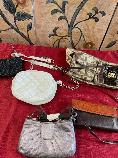 New and used assorted bags. 5 pieces