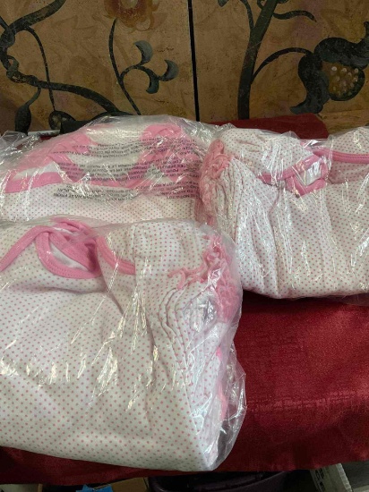 New Toddler Team Athletics 0/3M body suit. Each package contains 12 suites. 3 packages = 36 pieces
