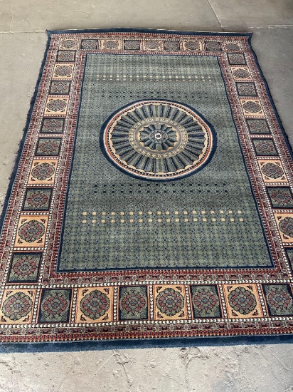 Carmel Carpets brand 93" x 64" area rug.