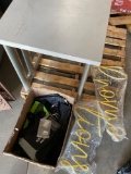 Desk, signs & assorted bags