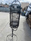 Large metal bird cage with stand. 76