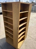 Rolling, rotating, display unit with shelving 54