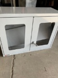 Uline two door, two shelf storage metal cabinet. 27