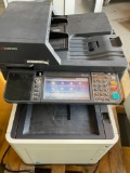 Kyocera Ecosys M6535cidn with cord color laser printer, turned on