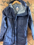 Sierra Design seems to be s/m blue rain jacket. Zipper works very good condition