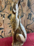 Stone cat statue. 24