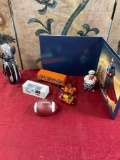 Collectibles, Superman portrait, Bakery man Figurine, Miniature trucks, & Golfclubs, etc.