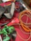 Assorted items. Straps, jumper cables, tool belt, funnels etc. 8 pieces