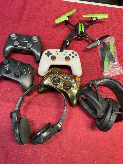 Assorted controllers, head phones, etc. 7 pieces