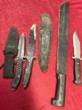 Assorted knives ( two have sheathes) & machete. 4 pieces