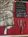 Pace Setter air drill and assorted tool sets. Majority are missing tools