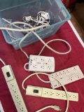 Assorted electrical cords, surge protectors.