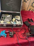 Tattoo machine with accessories & case, turned on