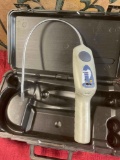 Inficon Tek Mate refrigerant leak detector, turned on with case