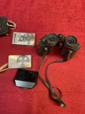 Panasonic & Sony cameras, Ansco 7 x35 binoculars, Surfola unit. 4 pieces