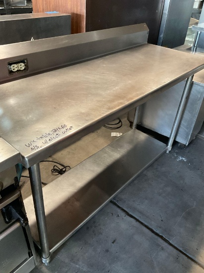 Stainless steel work table 24" x 60" with electrical outlet