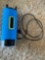 Scosche boom bottle with charger cable, has broken pedestal, works.