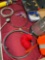 Assorted items. Gauge, hoses, air gun, helmet, vest, etc. 12 pieces