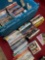 Assorted DVDs and CDs. Over 80 pieces includes storage tub