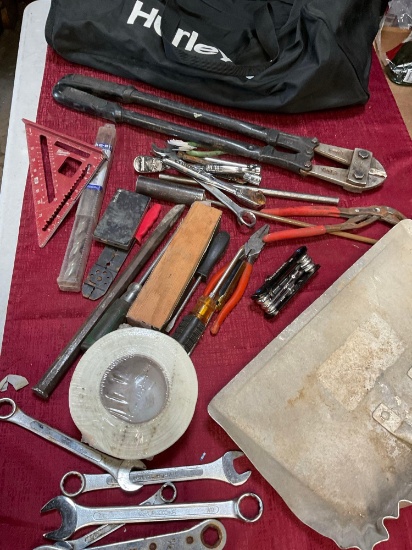 Hurley duffle bag and assorted tools